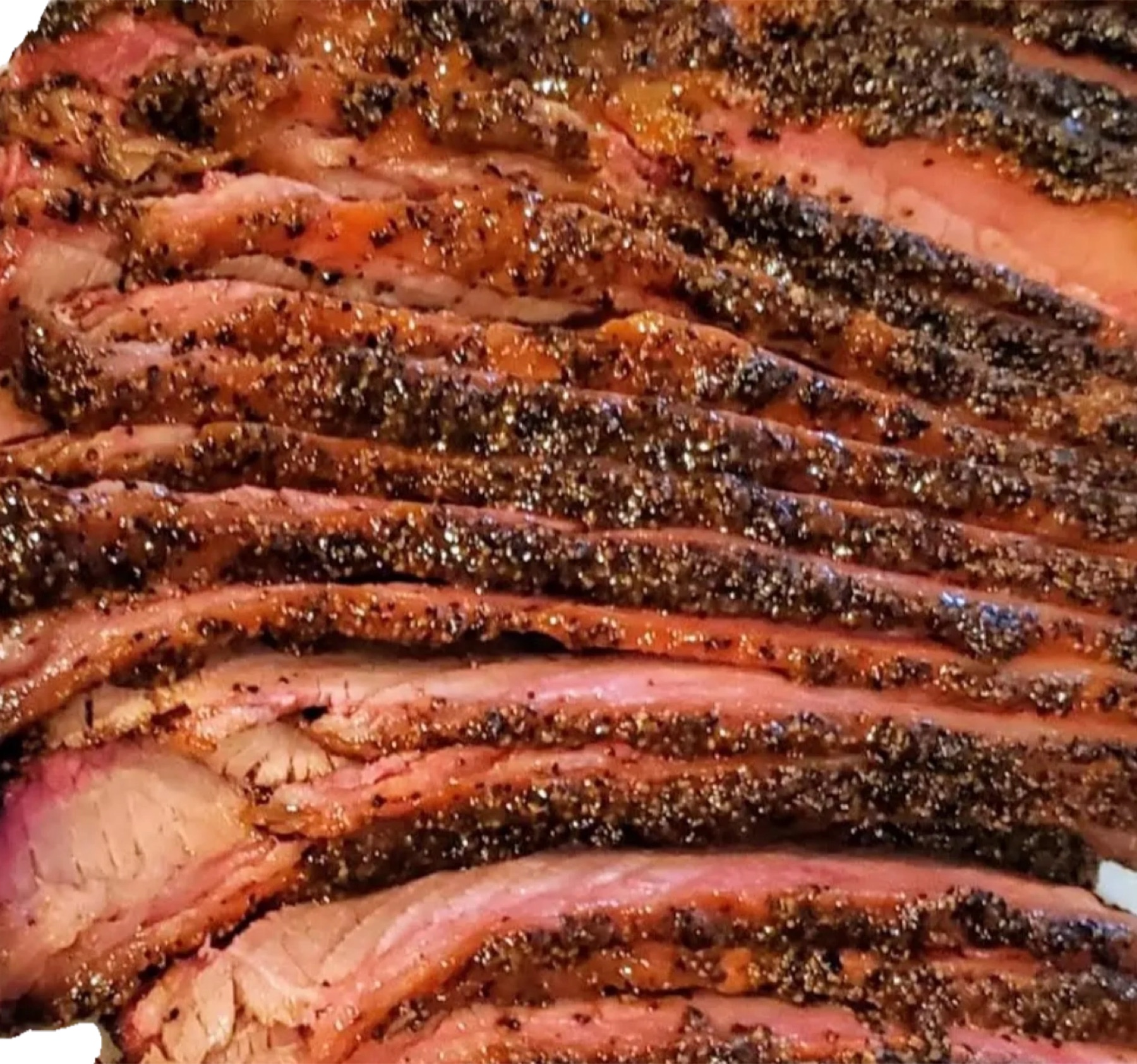 Smoked brisket on the grill at Smokin A's Good Eats